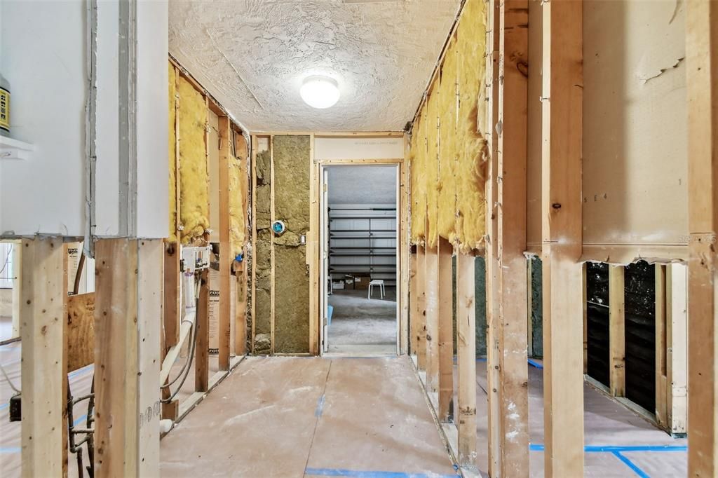 Laundry room and entrance to the two car garage.