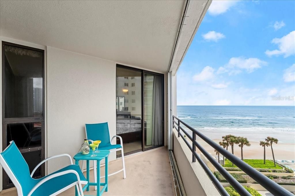 South-facing balcony overlooking ocean waves