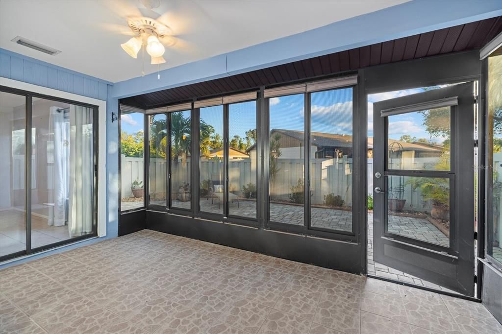 Florida Room with sliding doors to the Primary Bedroom