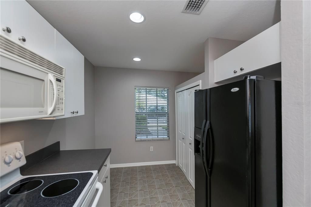 eat-in kitchen with wall pantry