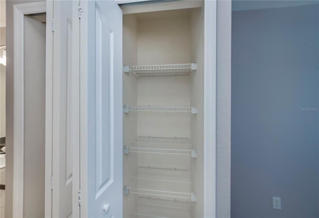 primary suite walk-in closet & separate linen closet