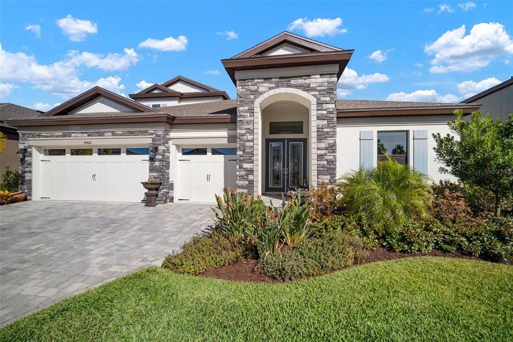 Front Elevation with Brick Paver Driveway