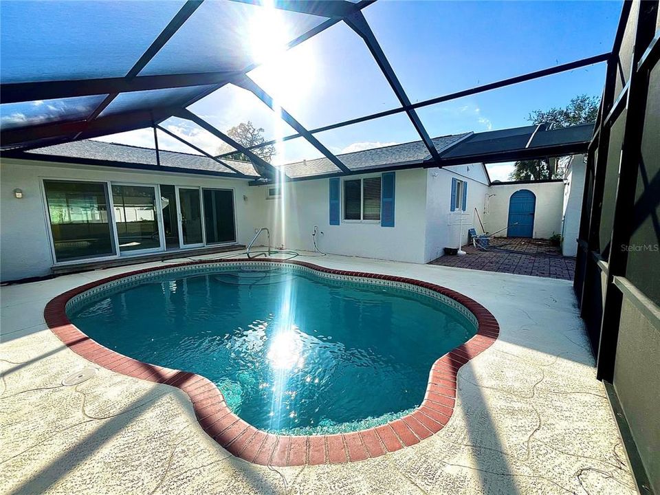 Entryway to pool from front home. Great to add an in law apt.