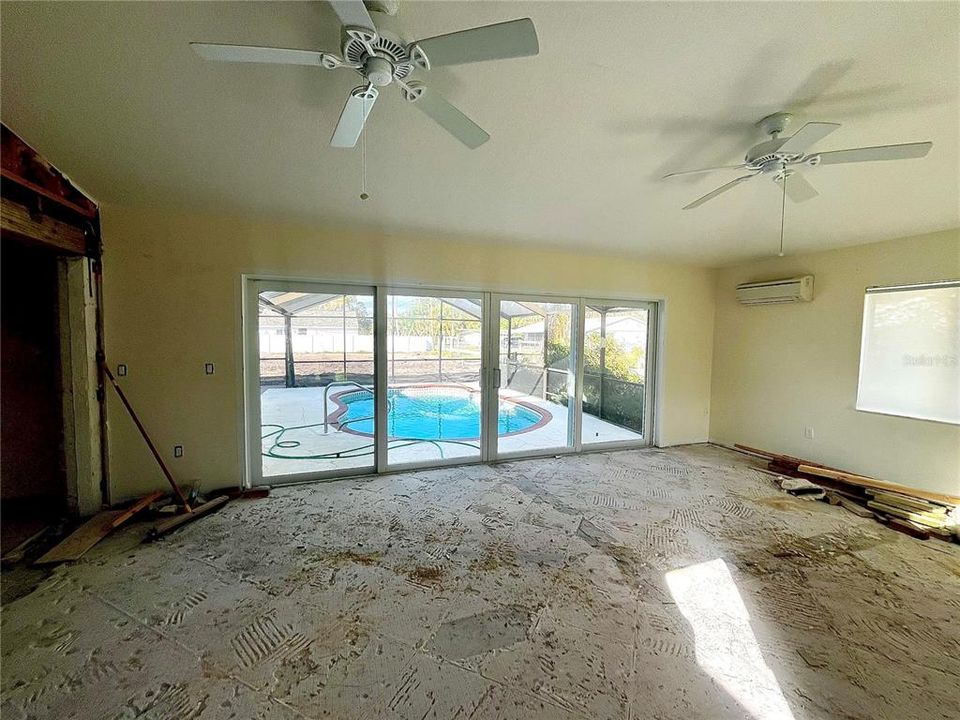 Large bonus room to pool area and another side patio