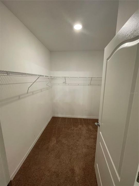 Master bedroom walk in closet 1