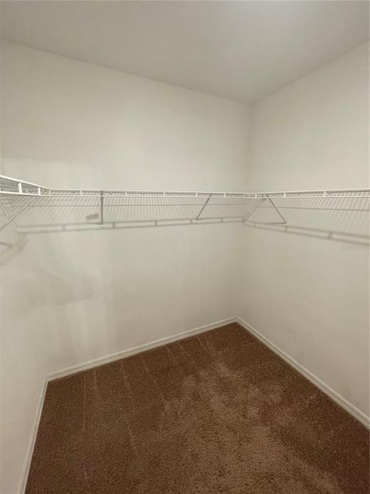 Master bedroom walk in closet 2