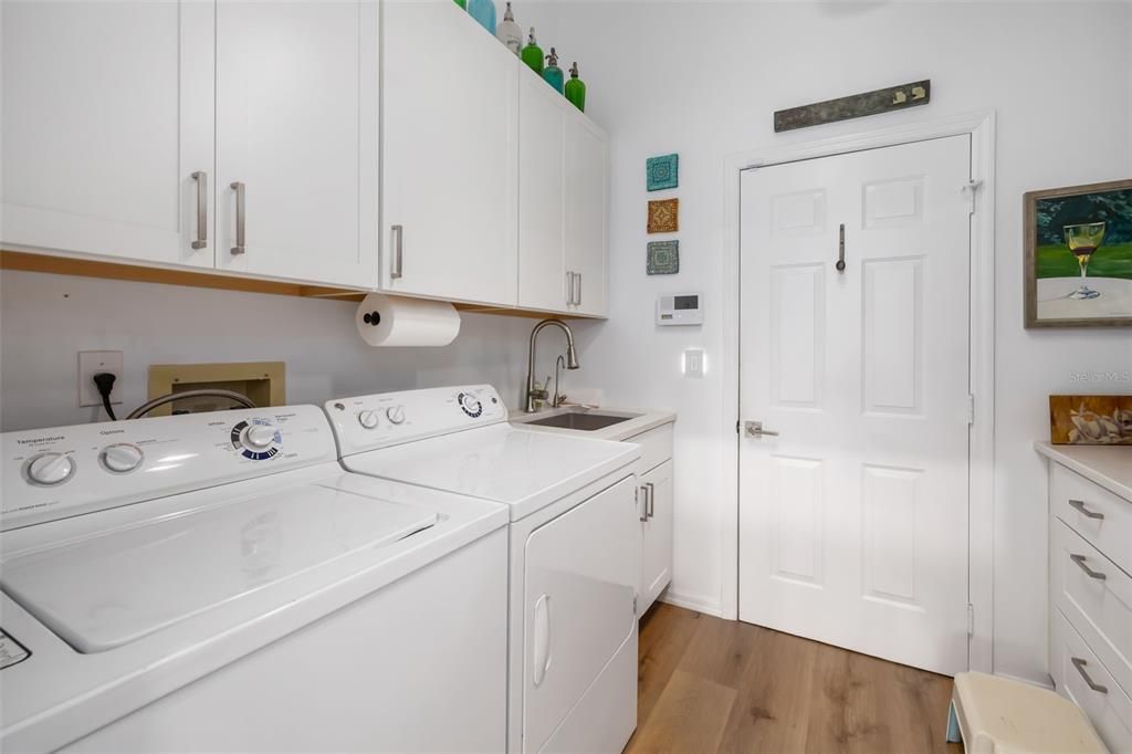 Laundry / butler's pantry with reverse osmosis at the sink and new Kraus tap