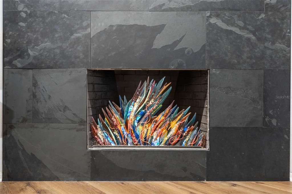 Slate fronted wood burning fireplace