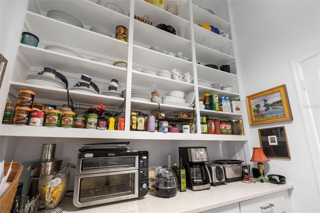 Counter top to ceiling shelving