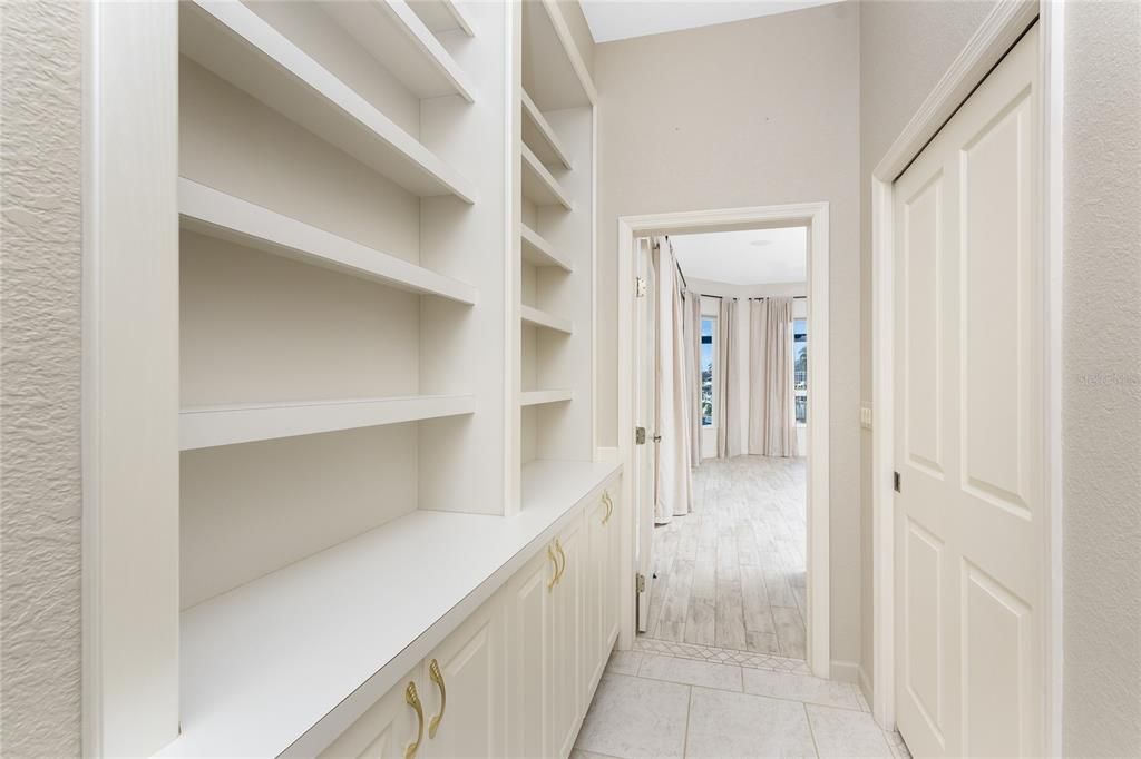 Hall between Primary Bedroom and Primary Bath...with Tons of Storage here too