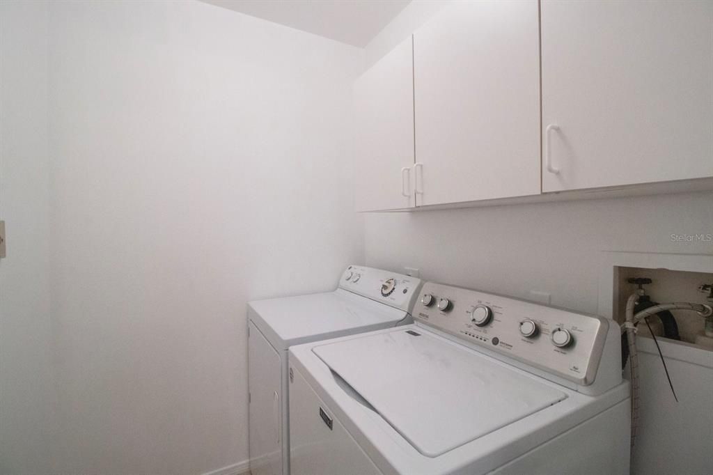 Separate laundry room.