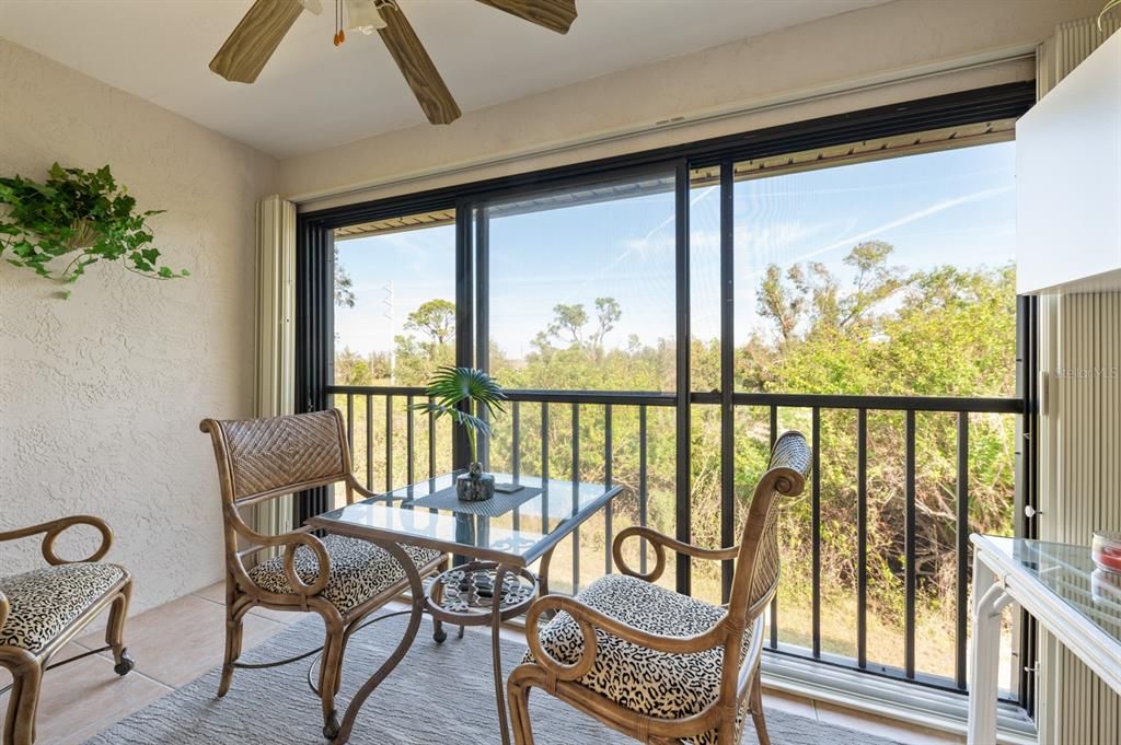 Year round enjoyment on this lanai with two sets of sliding glass doors