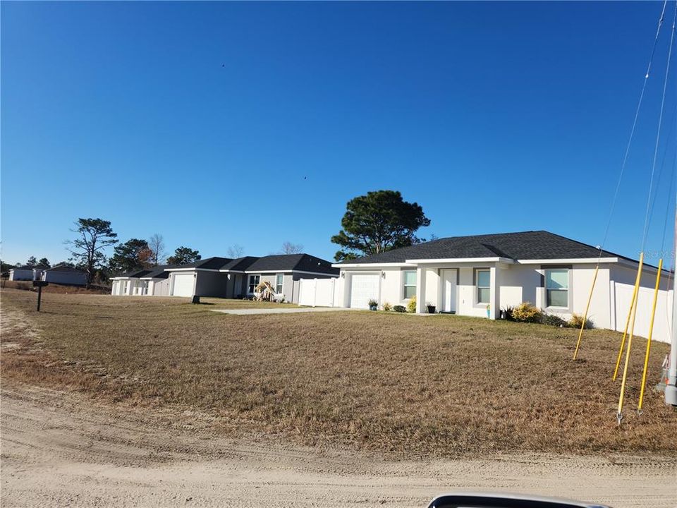 new houses with the new fence to the west of lot 32