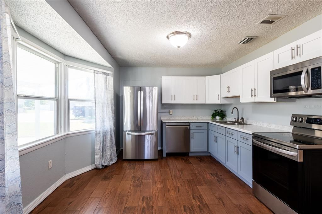 Kitchen has newer appliances and soft close drawers and cabinets.