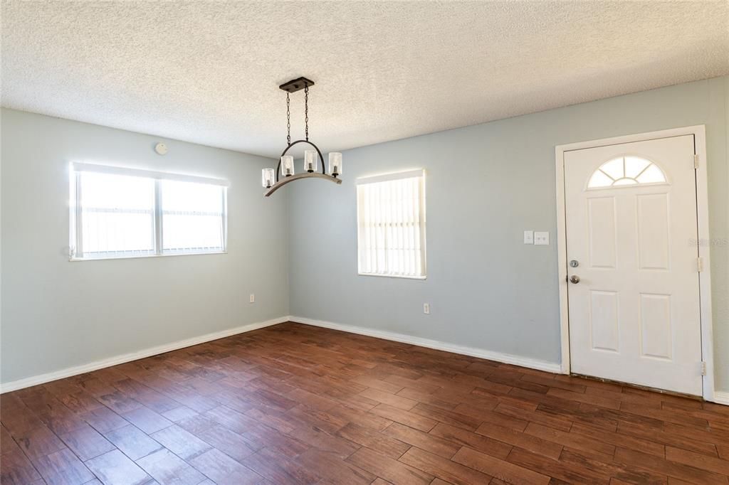 Enter into this spacious dining room that could also be used as a second family room.