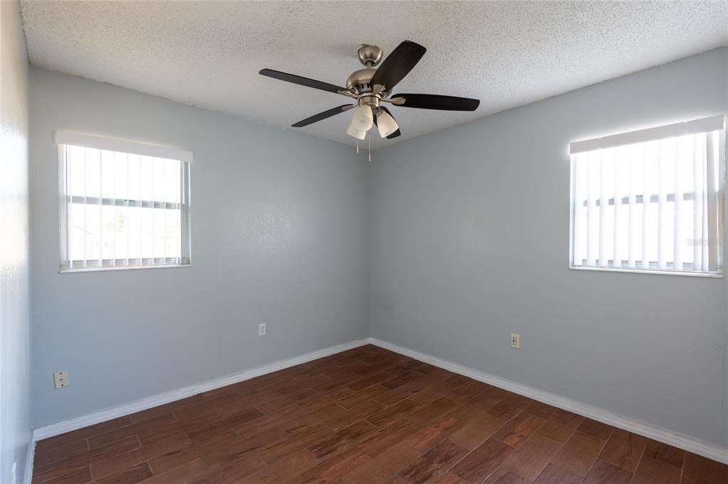 Third bedroom located at the end of the hall.