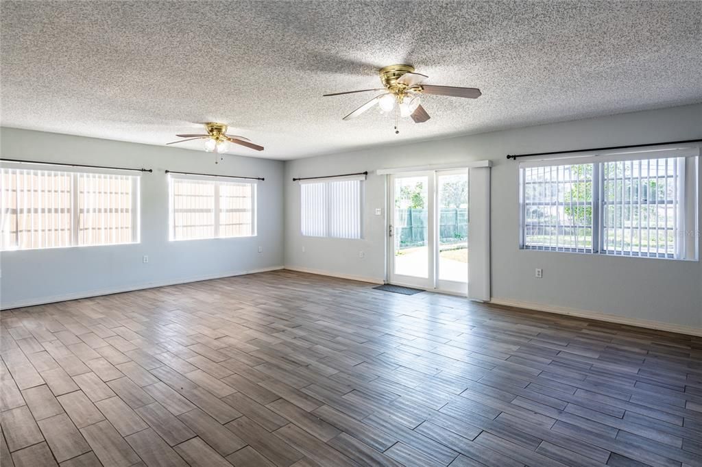 This spacious room is 24.6 x 19.5.