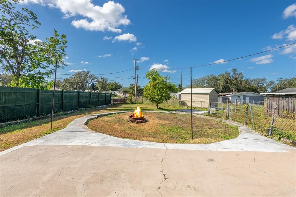 There used to be a pool in the circle.  There is also an outdoor sink to build an outdoor kitchen and large patio for relaxing.