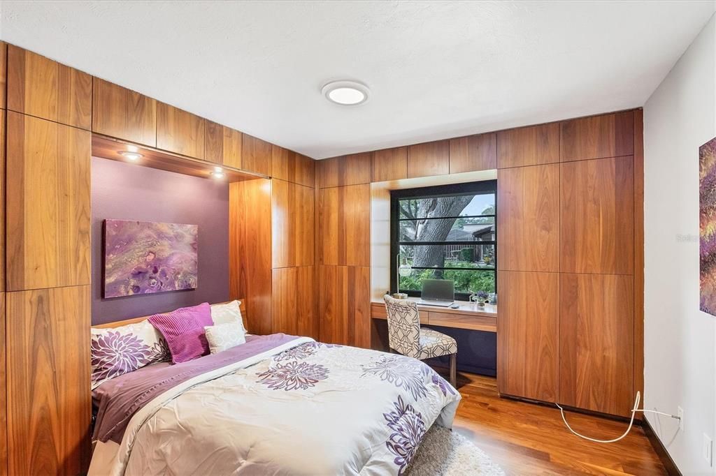 Front bedroom full of built-ins including a murphy bed