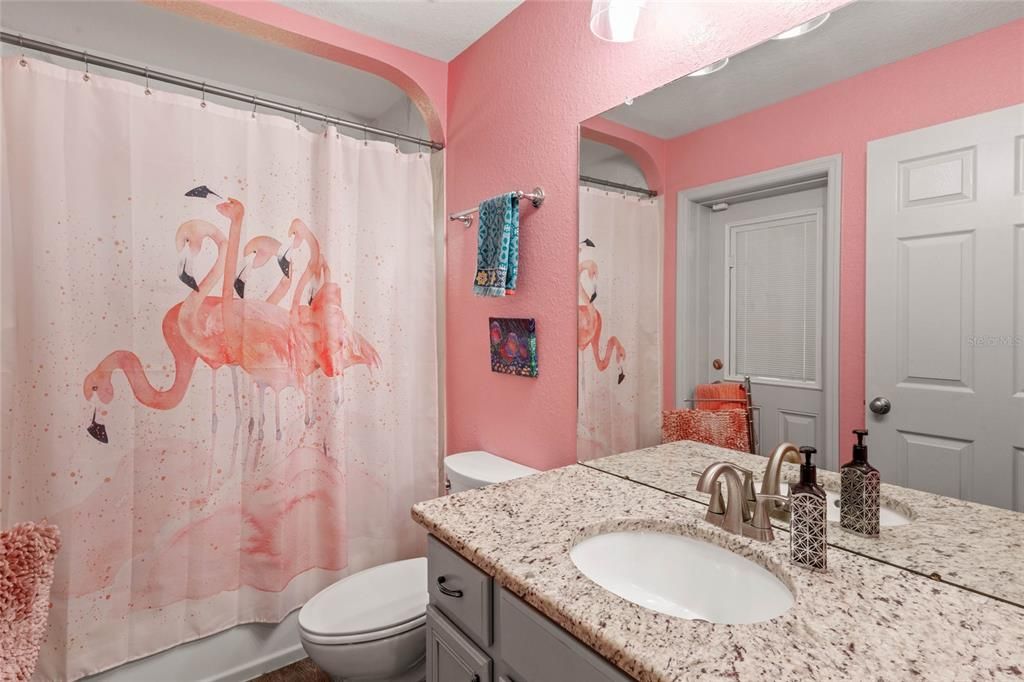 FULL GUEST BATHROOM WITH ACCESS TO LANAI (COULD BE USED AS A FUTURE POOL BATH)