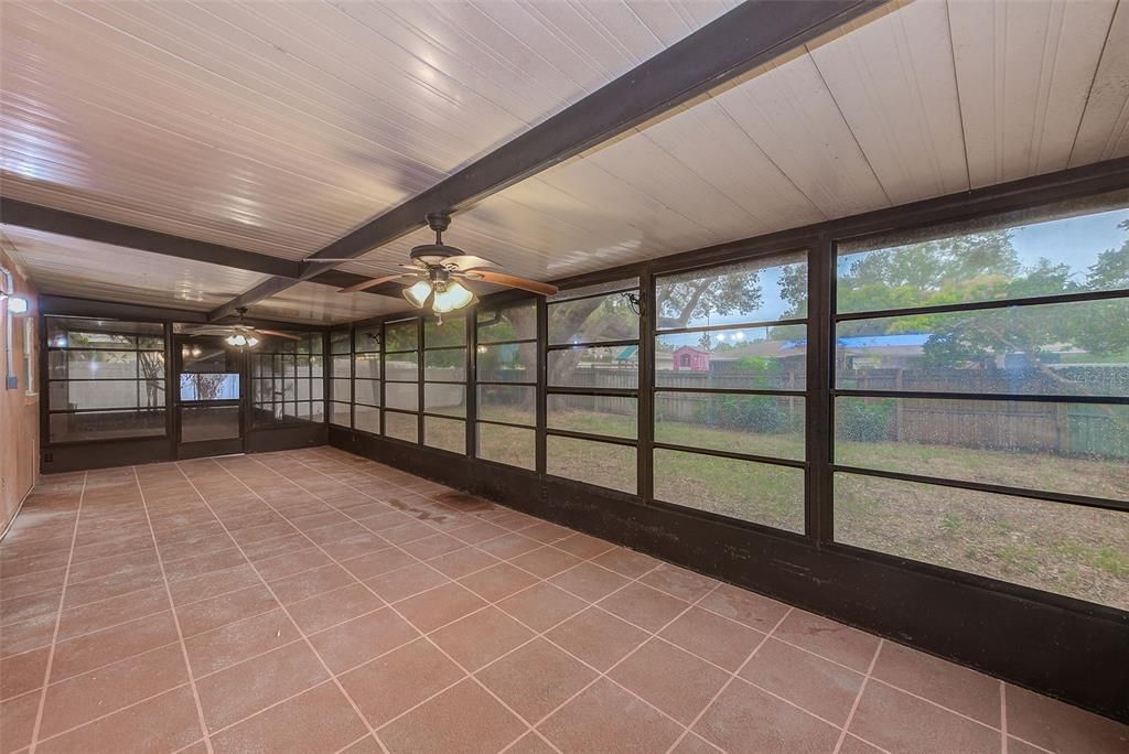 Large Florida room with screened porch attached