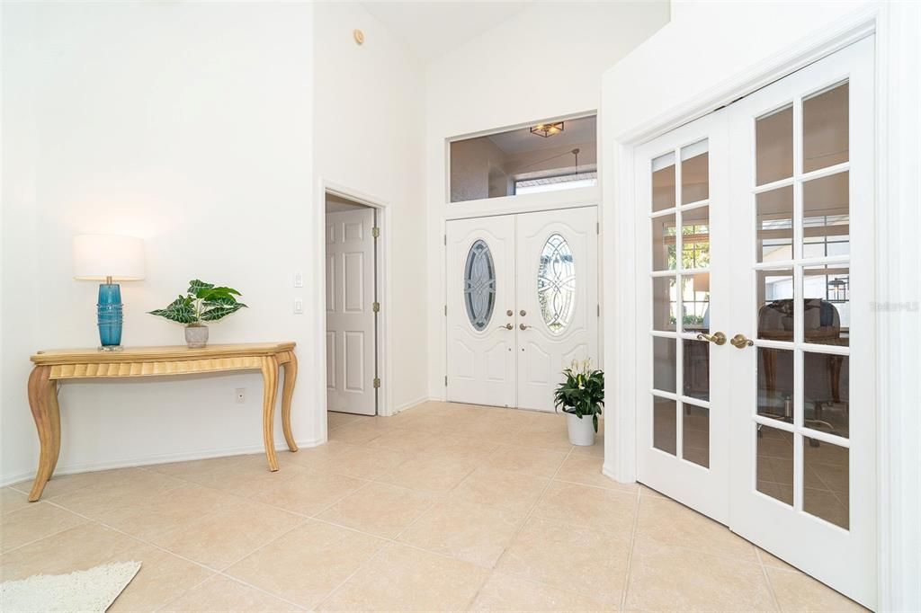 Master Bedroom to the left and Guest bedroom/office through the French Doors to the right