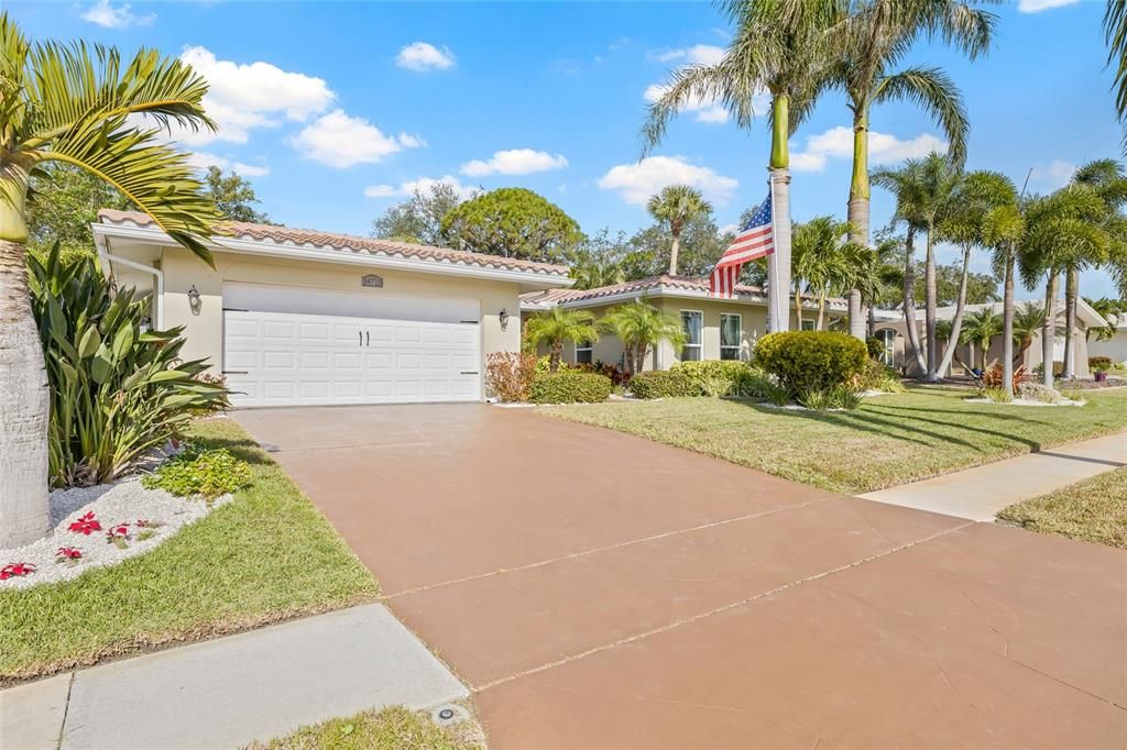 Front view with 2 car garage