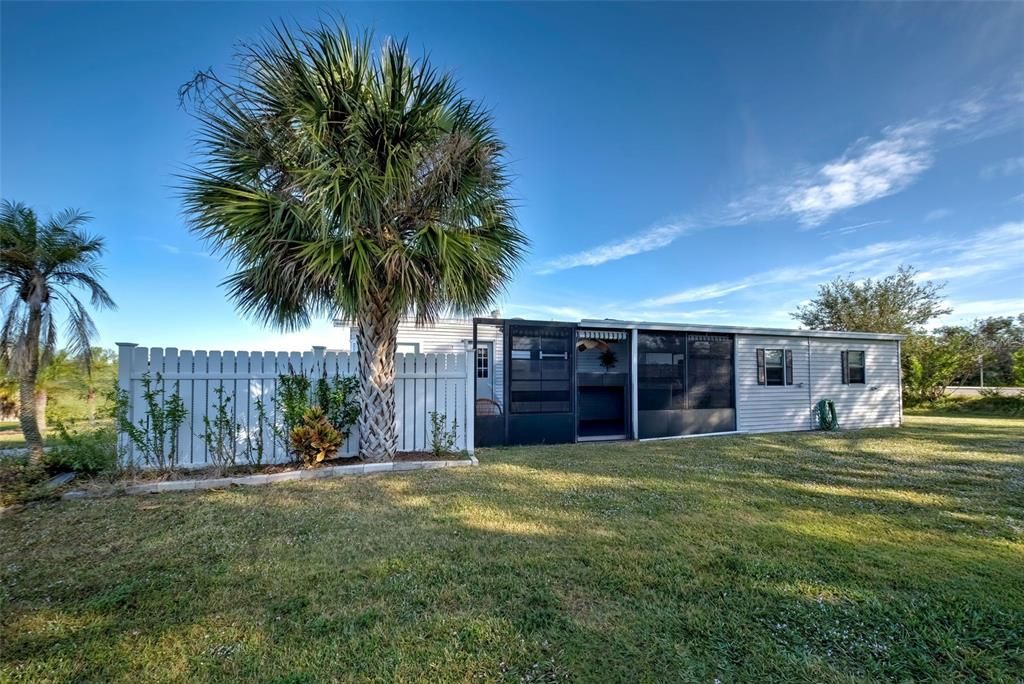 SIDE VIEW - CARPORT AND LANAI AREA