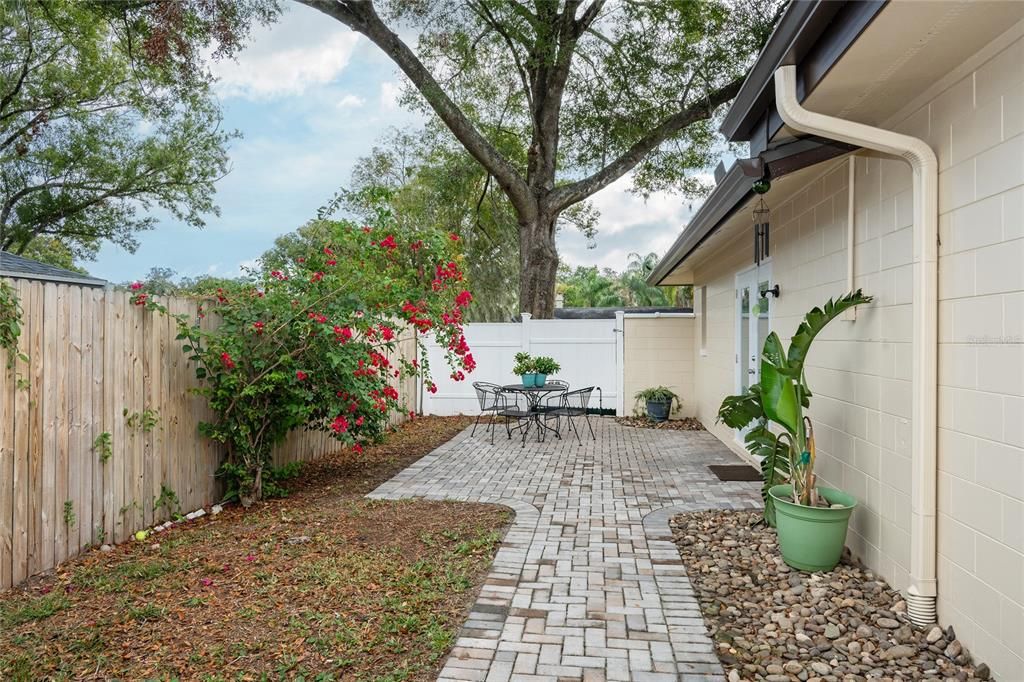 Pavers on private patio though French doors from the primary suite.