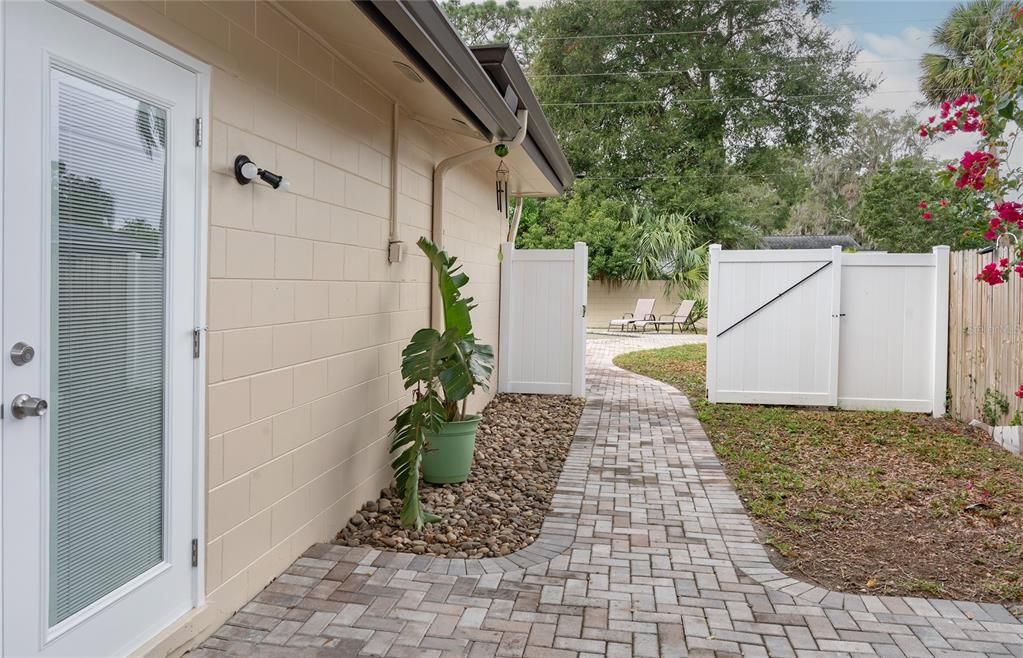 Side patio fenced on both sides for privacy. French doors to primary suite