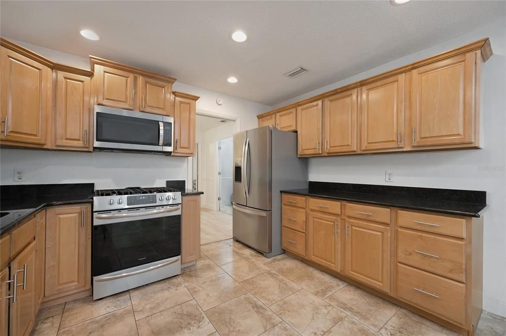 Kitchen with opening toward dining room