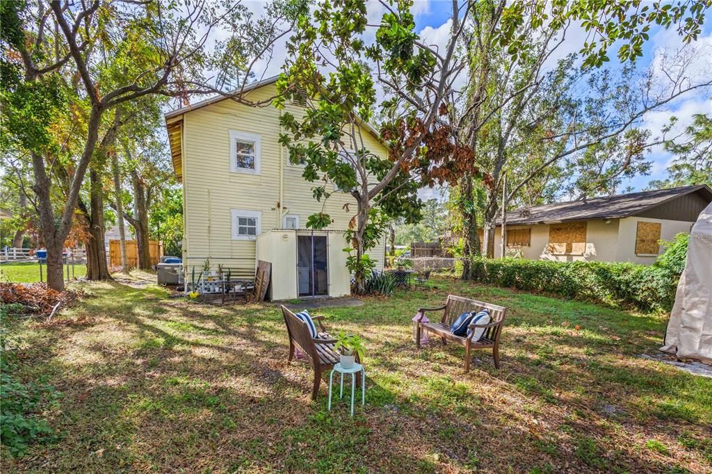 Shared laundry shed behind house