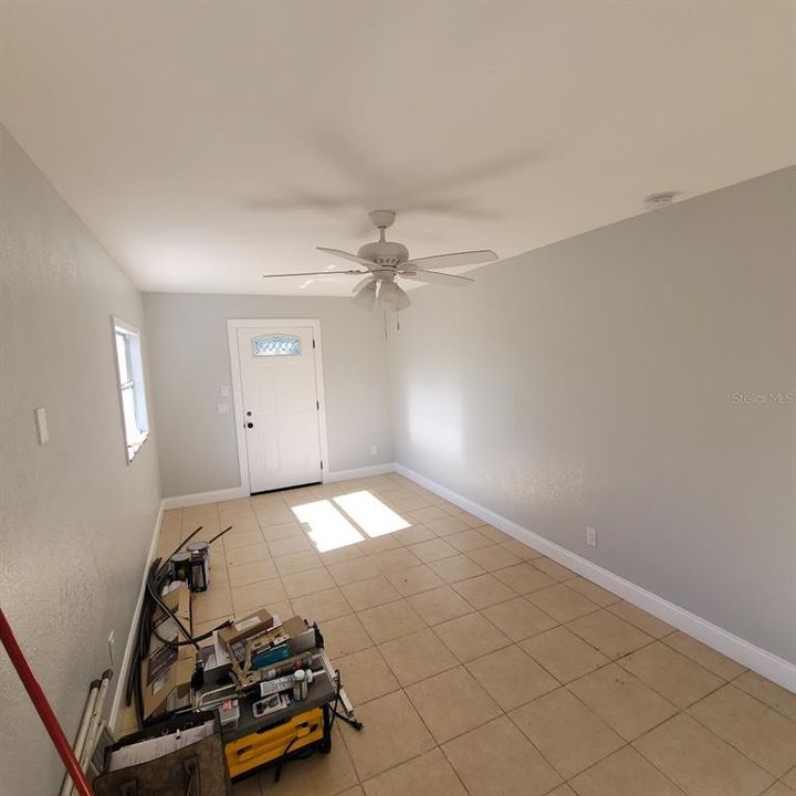 This is the 9.5 X 19 Family Room that has the entrance door and also a side door. This room leads to the kitchen as you will see in the next photo.