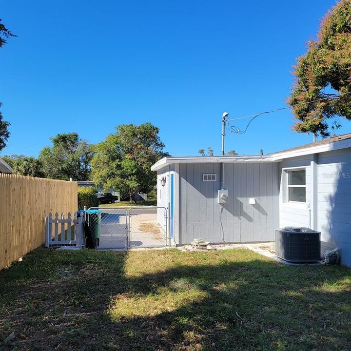 Same area showing more of the fence and driveway.