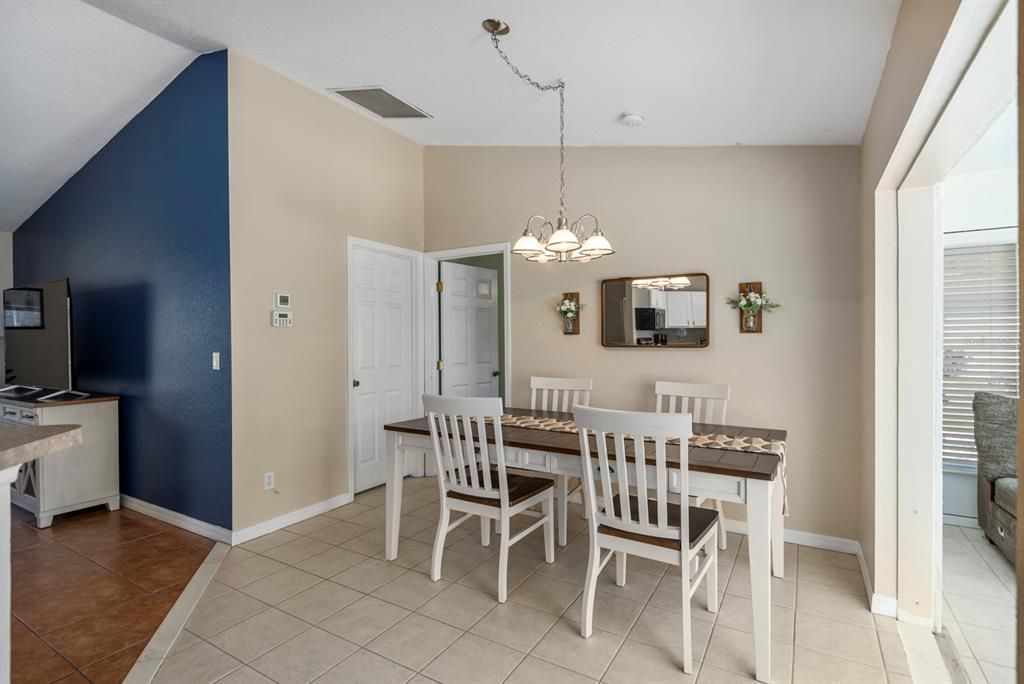 Door on the left leads to the laundry room and other door is primary bedroom