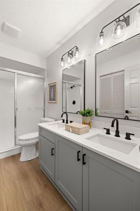 Primary bathroom with double sink Quartz vanity