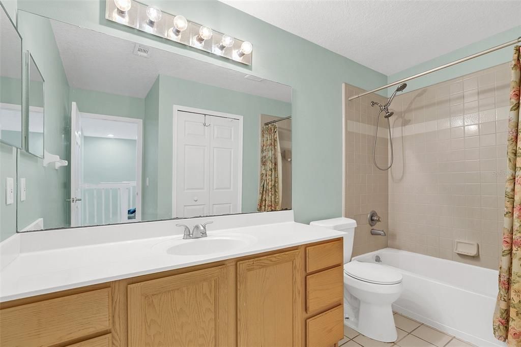 Bathroom upstairs between three bedrooms