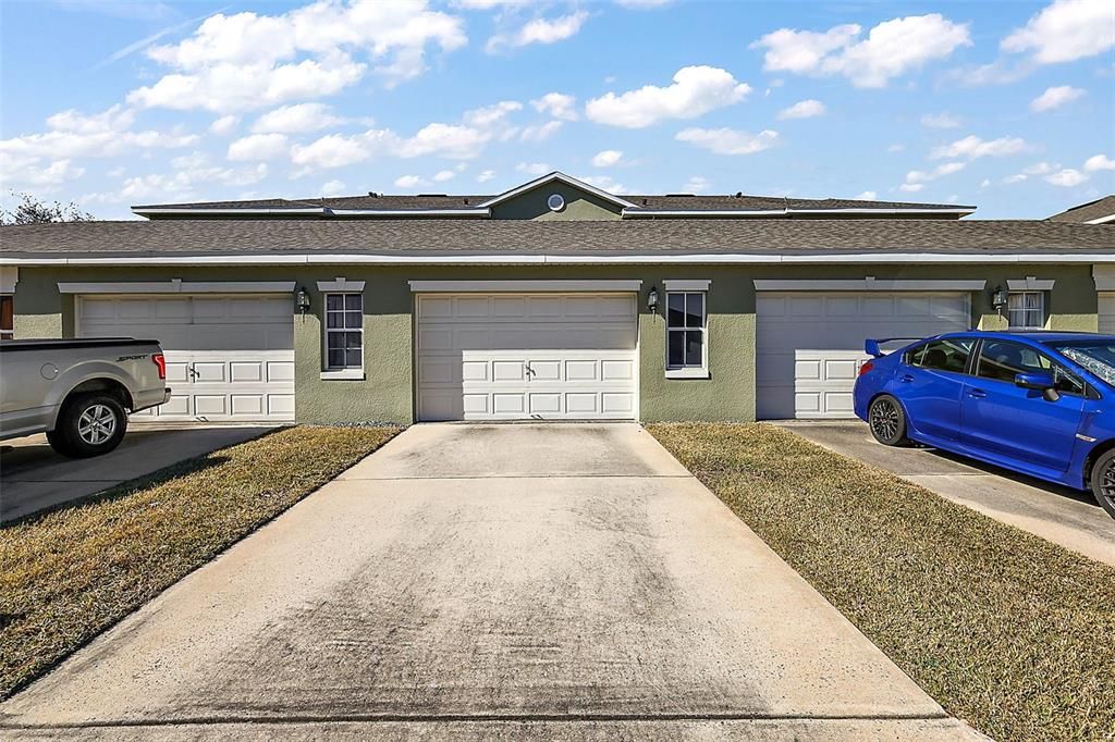 Rear entrance, oversized one car garage with driveway space for an additional car