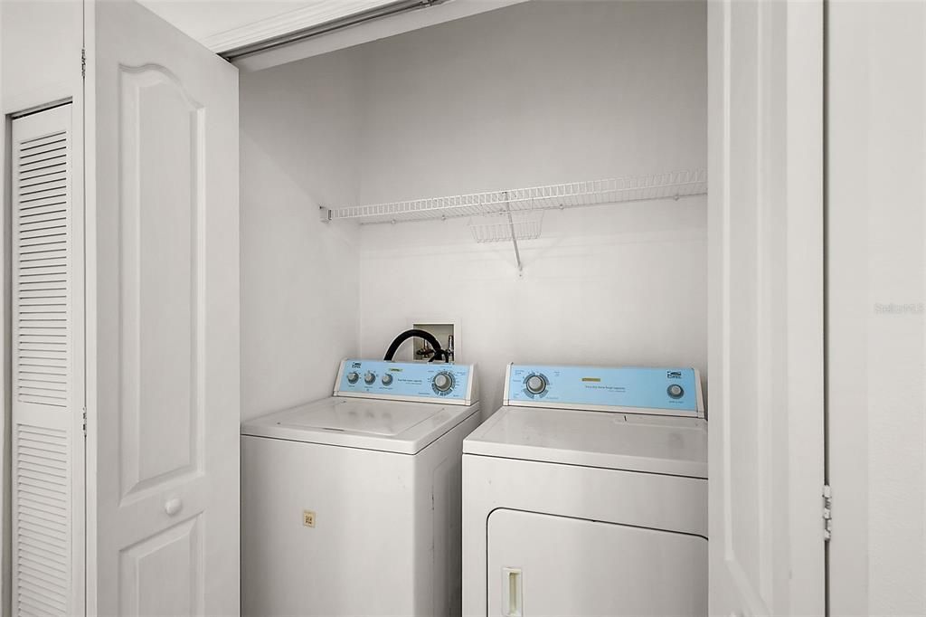 Upstairs laundry room with washer and dryer