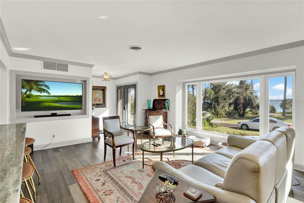 ENTRY DOOR TO FORMAL LIVING ROOM AND DINGING ROOM AND THE WINDOW WUTH A VIEW