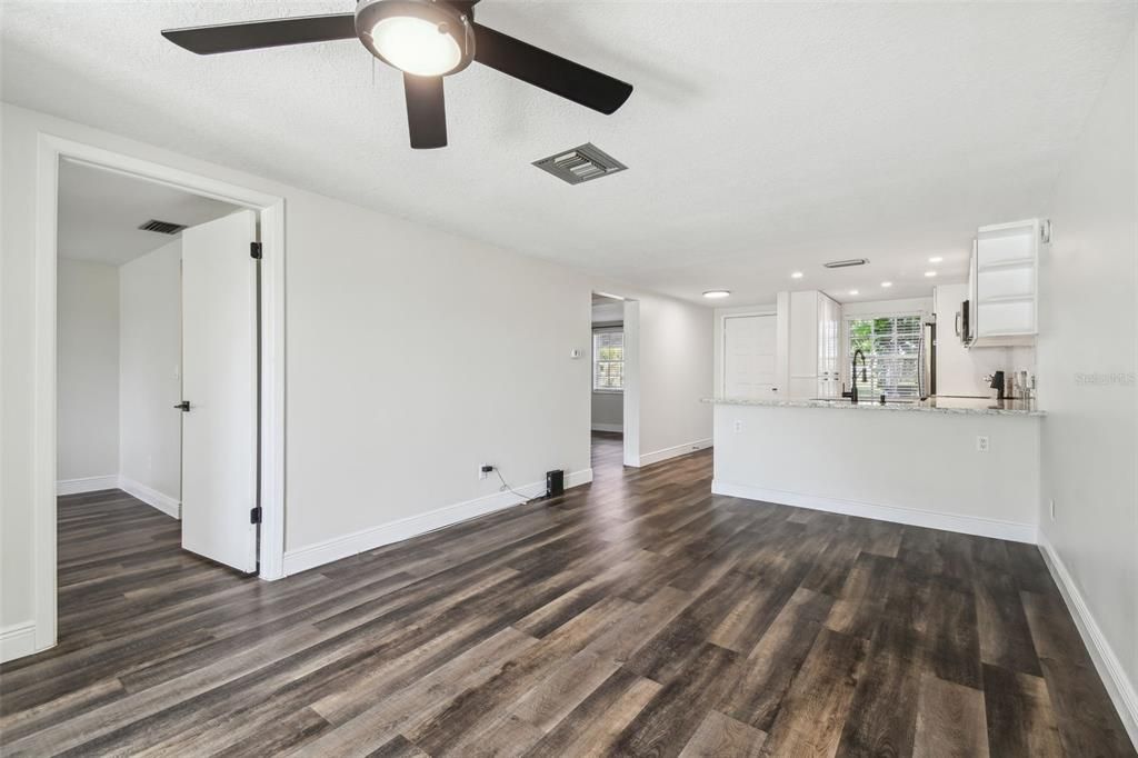 NEW LUXURY VINYL PLANK FLOORING THROUGHOUT + FRESHLY PAINTED INTERIOR