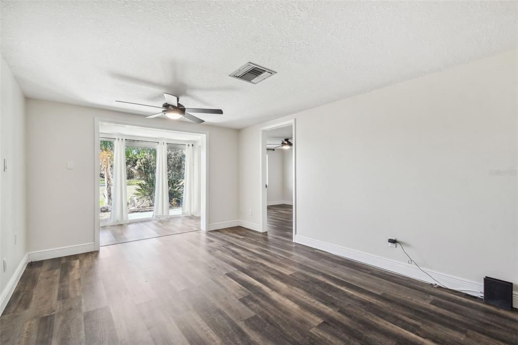 NEW LUXURY VINYL PLANK FLOORING THROUGHOUT + FRESHLY PAINTED INTERIOR