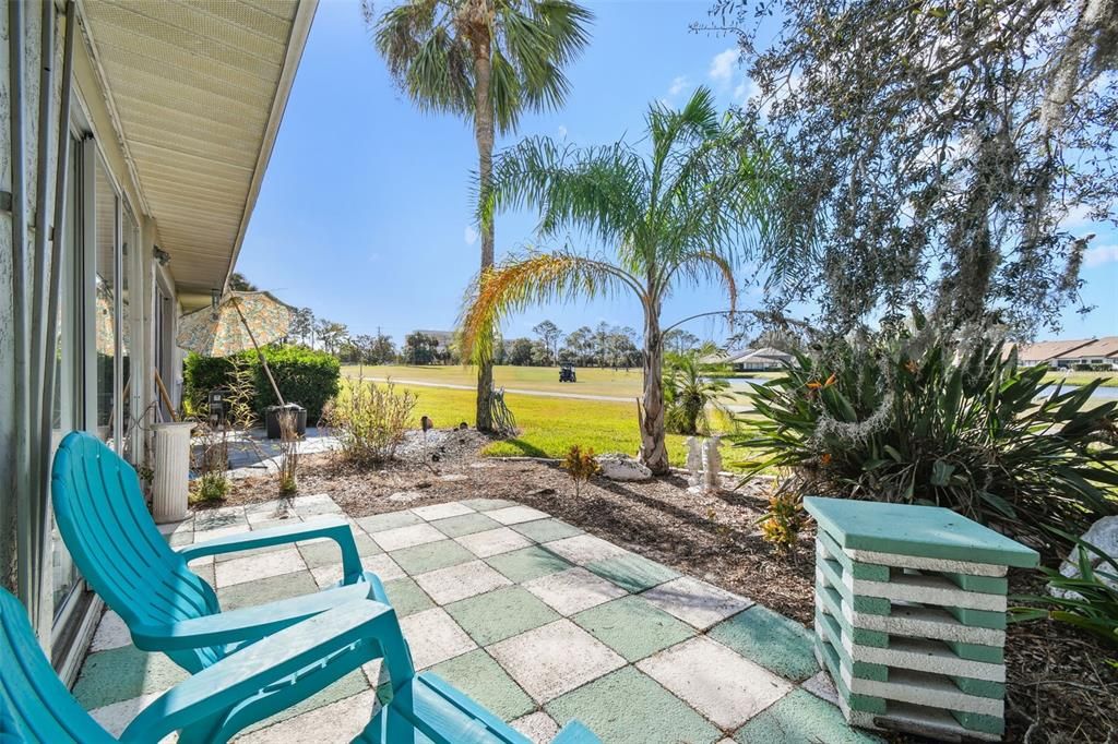 Rear patio with golf course views.