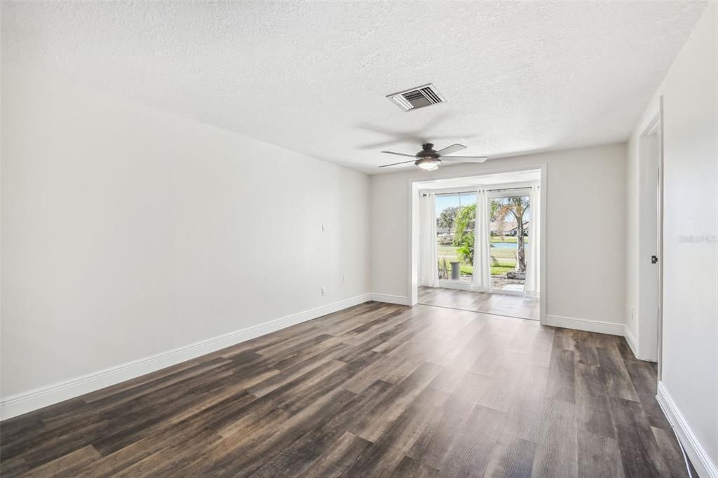 NEW LUXURY VINYL PLANK FLOORING THROUGHOUT + FRESHLY PAINTED INTERIOR