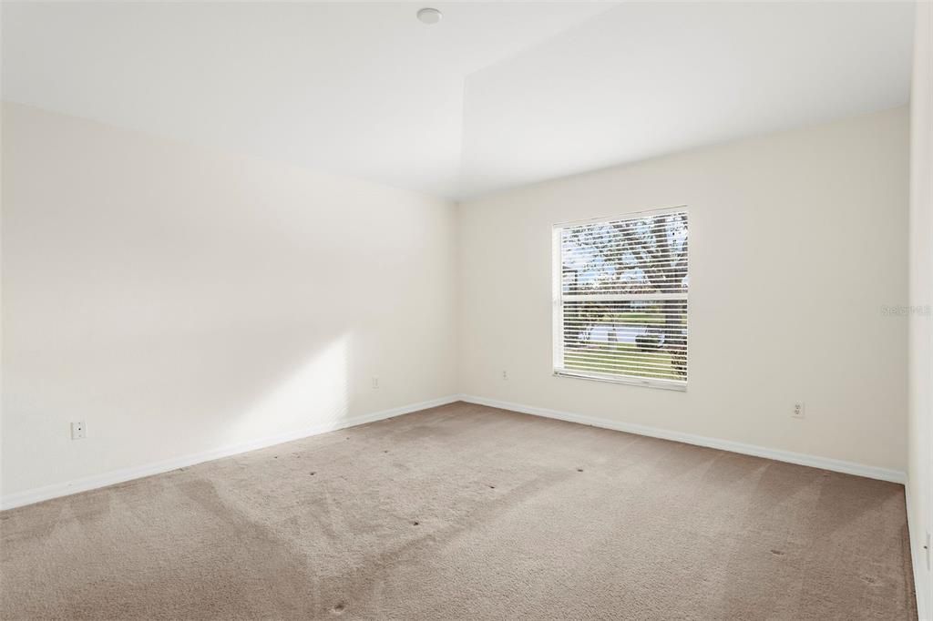 Primary bedroom with lake views