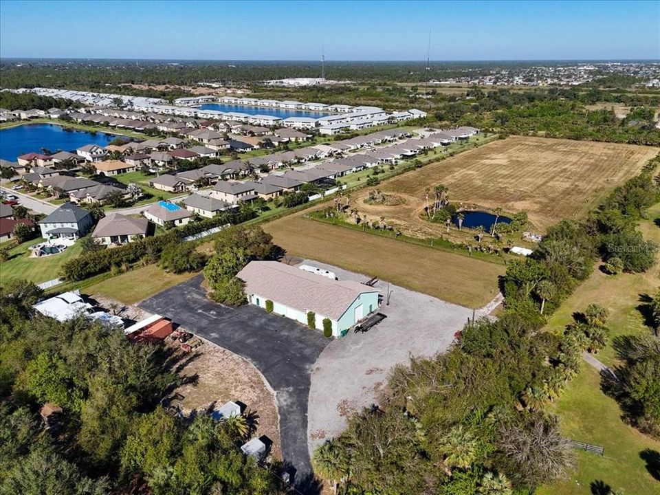 Front Aerial of Commercial Building with 8 overhead doors.