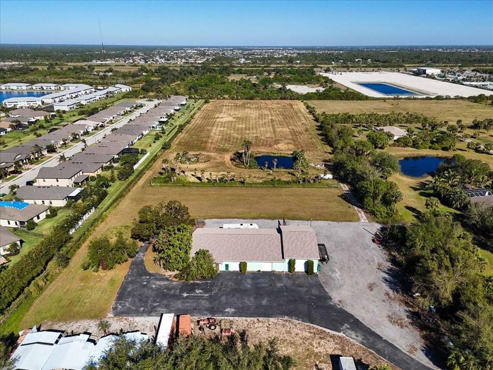 Front Aerial of Commercial Building with 8 overhead doors.