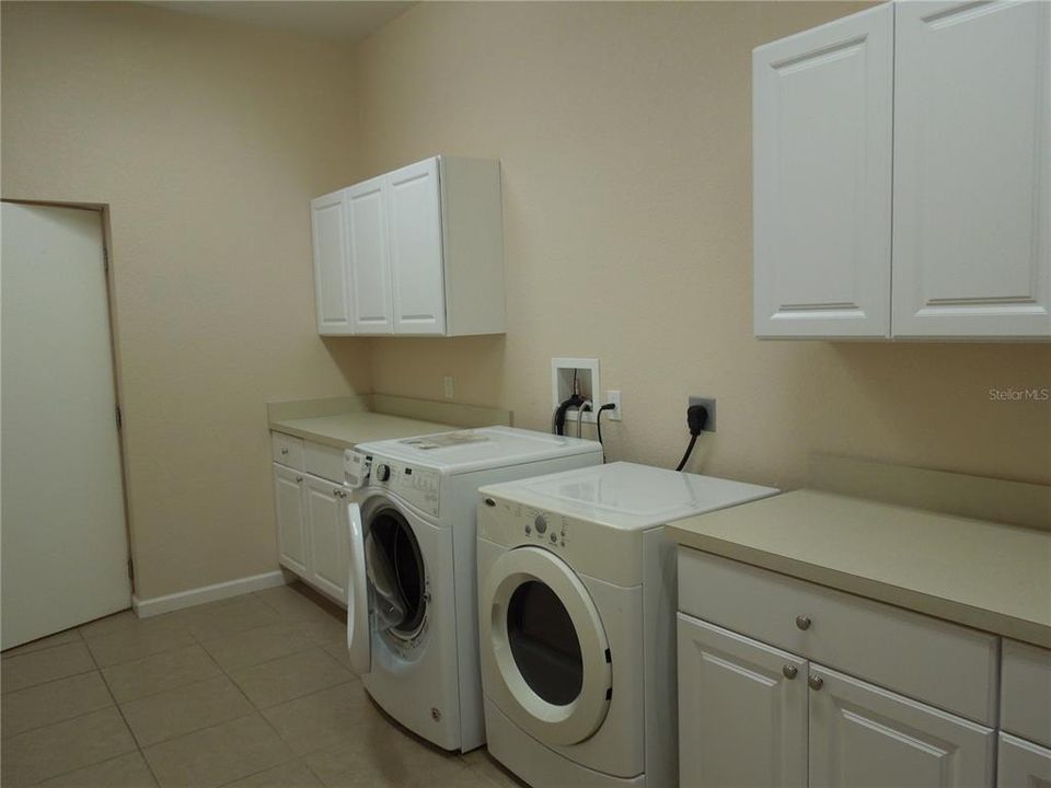 Apartment Laundry Room of Duplex at Tall Palms Ranch