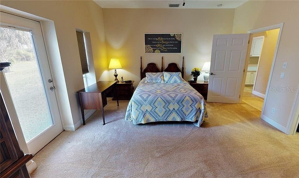 Primary bedroom of guest house side of Duplex at Tall Palms Ranch