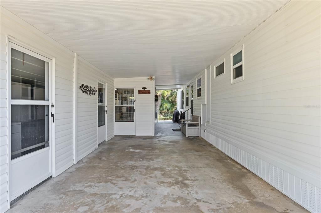 Carport with 2 Sheds